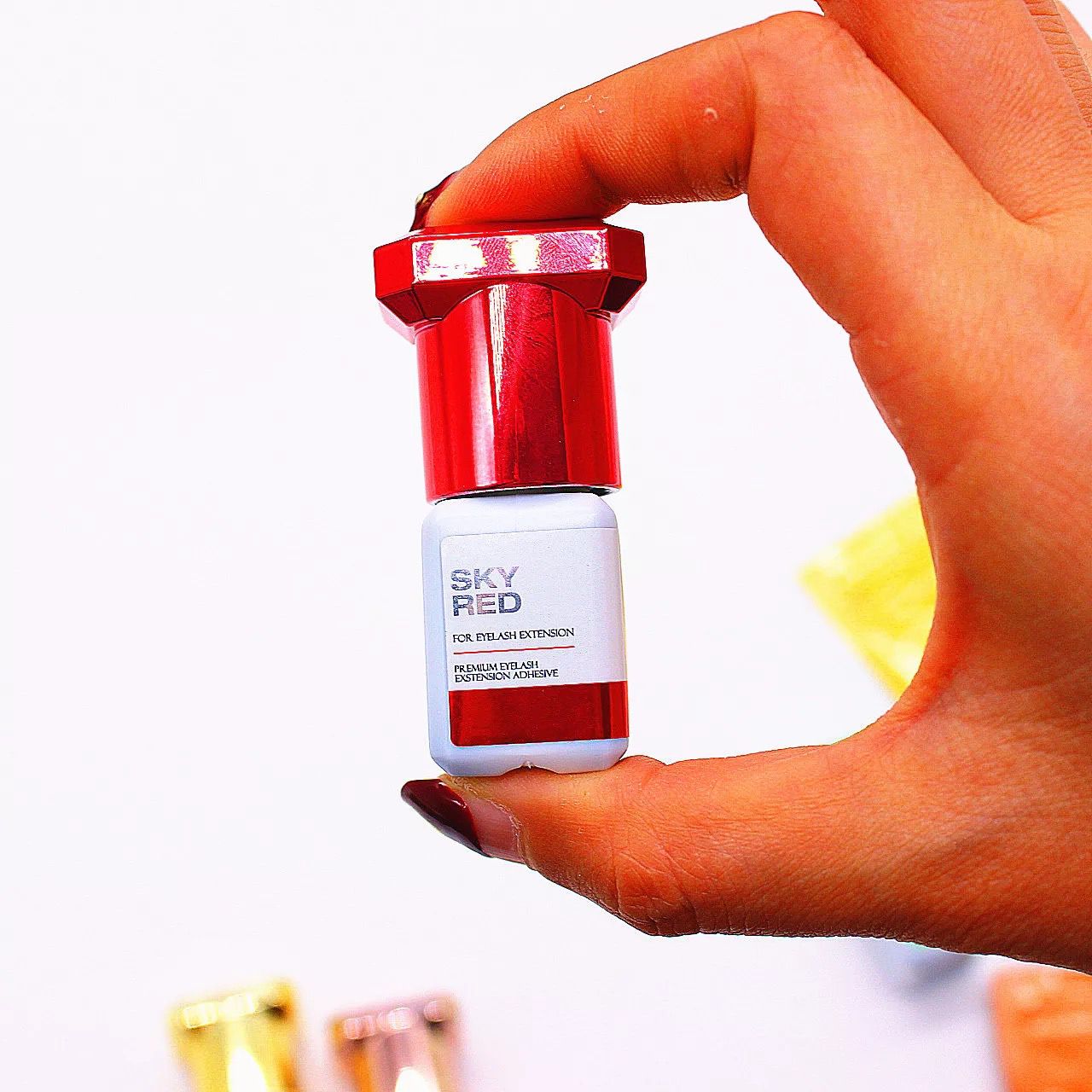 PEGAMENTO ADHESIVO PARA PESTAÑAS 1-2 SEG NEW SKY RED 5ML